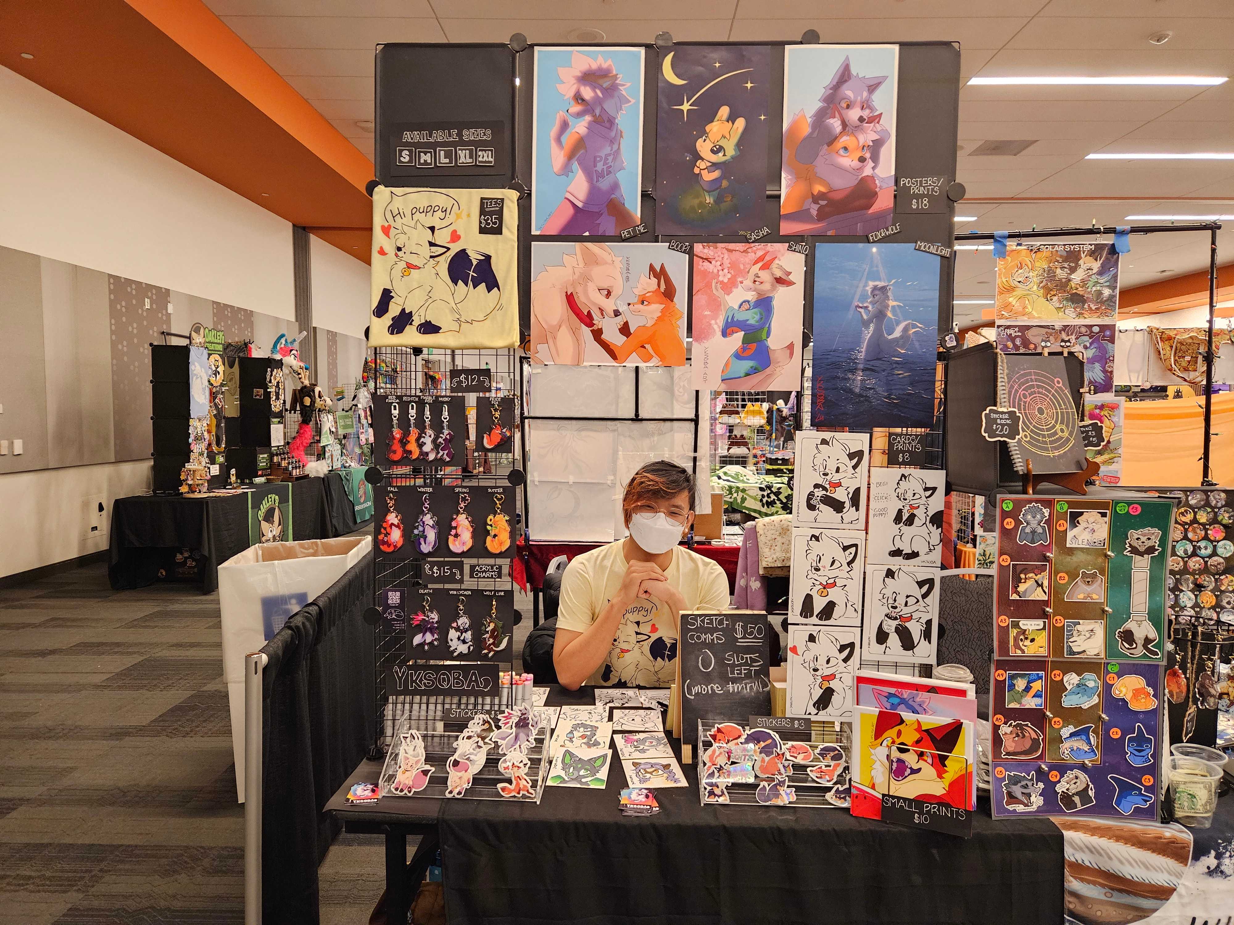 Soba (me) behind the table at Further Confusion '25