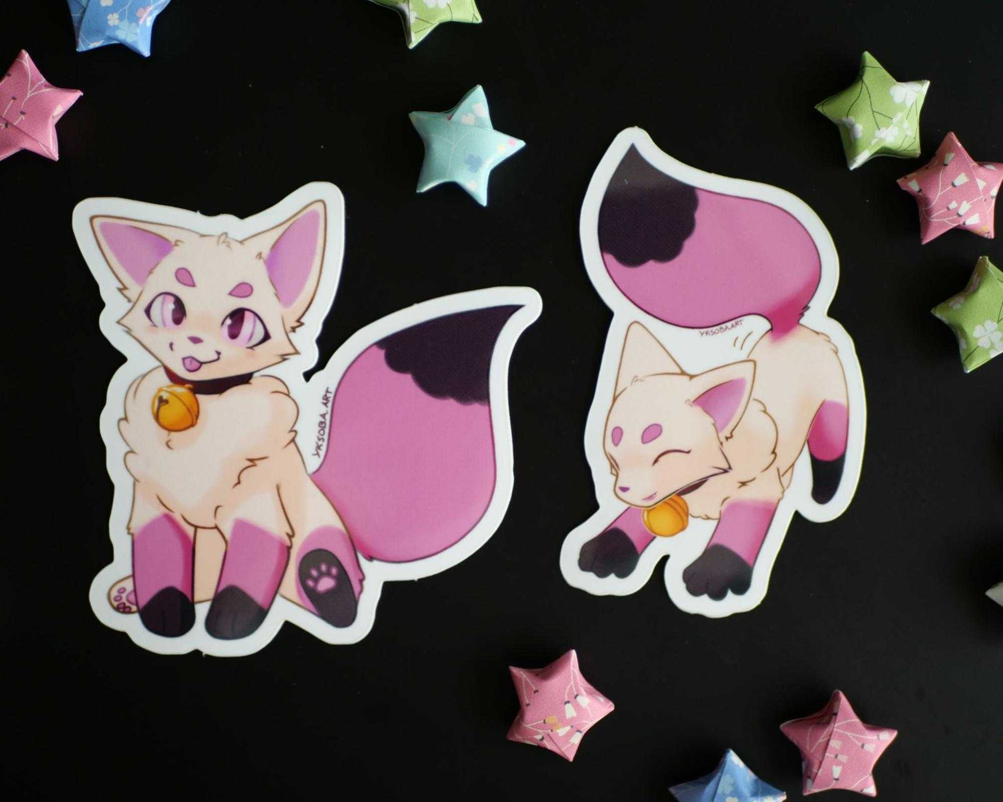 Two stickers of a neapolitan ice cream themed fox character